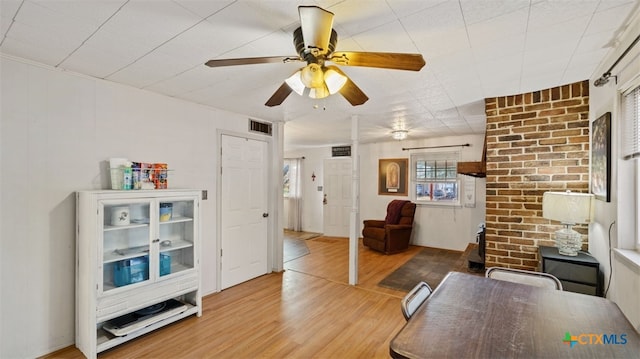 interior space featuring ceiling fan and hardwood / wood-style floors