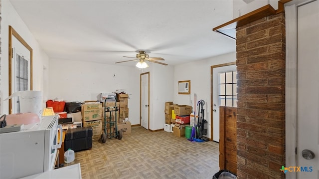 interior space featuring ceiling fan