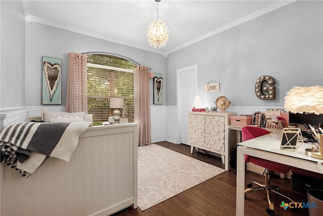 bedroom with a wainscoted wall, an inviting chandelier, wood finished floors, and crown molding