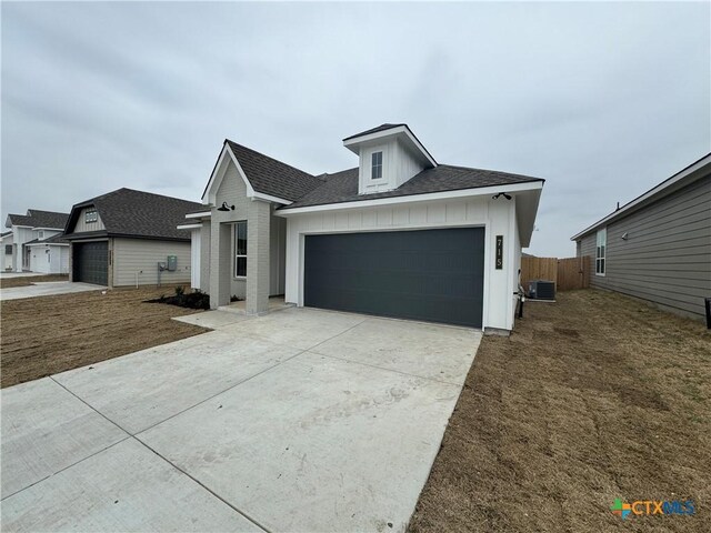 view of front of home featuring central AC unit