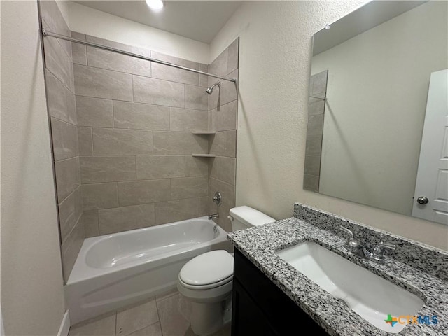 bathroom with tile patterned floors, vanity, toilet, and shower / bathtub combination