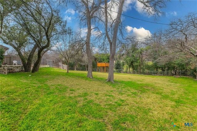 view of yard featuring fence