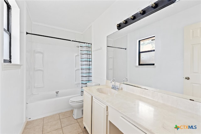 full bathroom featuring shower / bath combo with shower curtain, tile patterned flooring, vanity, and toilet