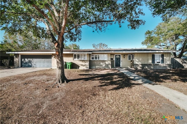 single story home with a garage