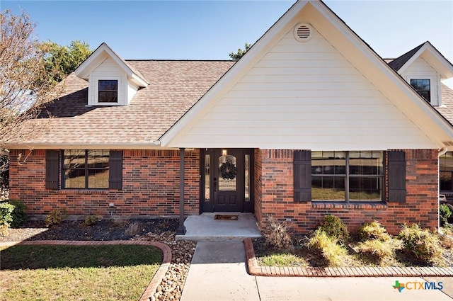 1104 Southridge, Salado, TX 76571 - view of front of house with brick siding and a shingled roof
