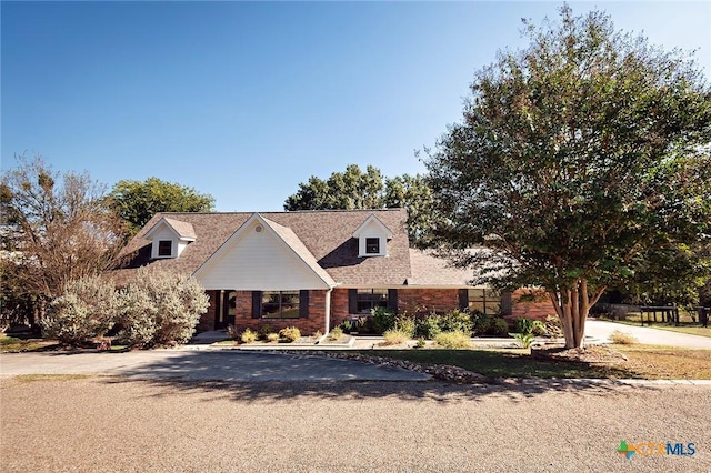 1104 Southridge, Salado, TX 76571 - cape cod-style house with brick siding and asphalt driveway