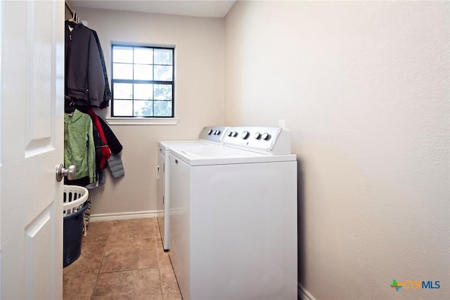1104 Southridge, Salado, TX 76571 - laundry area with separate washer and dryer, baseboards, and light tile patterned floors