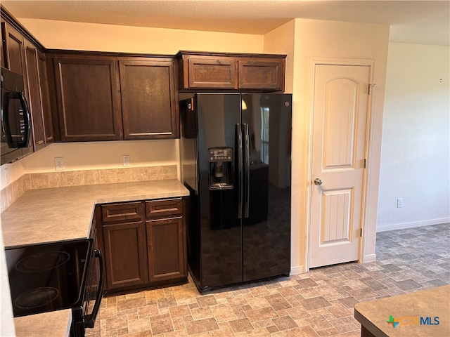 kitchen with dark brown cabinetry and black appliances