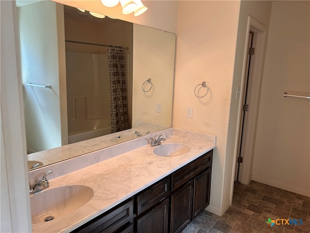 bathroom with vanity and shower / tub combo