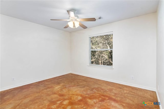 empty room featuring visible vents, baseboards, and ceiling fan