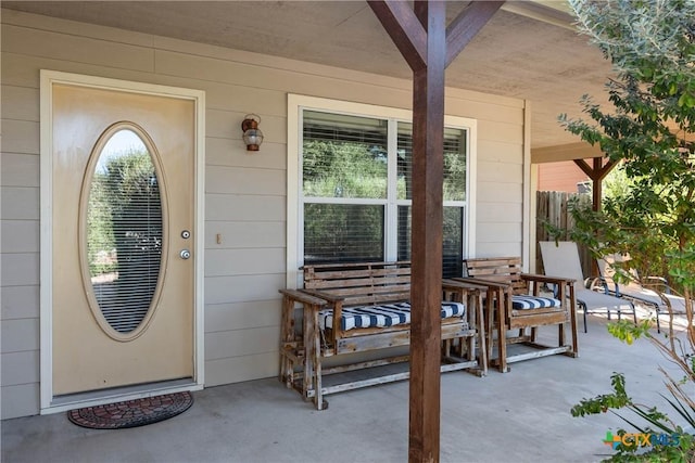 entrance to property with covered porch