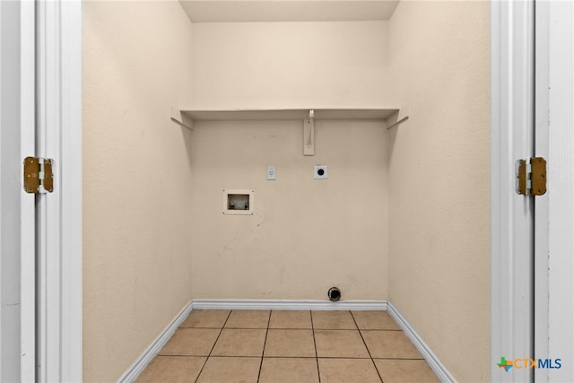 laundry room featuring light tile patterned floors, washer hookup, and hookup for an electric dryer