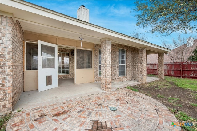 view of patio with fence