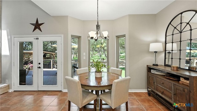 405 Pinnacle Pkwy, New Braunfels, TX 78132 - dining space with a chandelier, tile patterned floors, and french doors