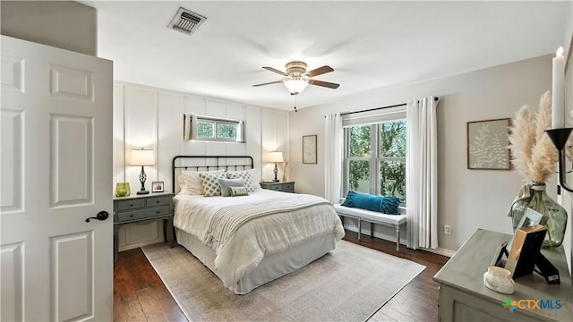405 Pinnacle Pkwy, New Braunfels, TX 78132 - bedroom featuring multiple windows, dark wood-type flooring, and ceiling fan