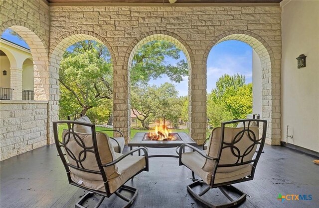 124 Schooner Dr, Lakeway, TX 78738 - view of patio / terrace featuring a fire pit