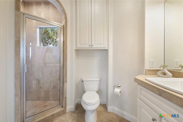 124 Schooner Dr, Lakeway, TX 78738 - bathroom featuring vanity, a shower stall, and tile patterned flooring