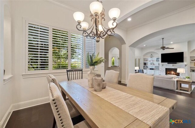 124 Schooner Dr, Lakeway, TX 78738 - dining space with ceiling fan, a chandelier, ornamental molding, recessed lighting, and wood finished floors
