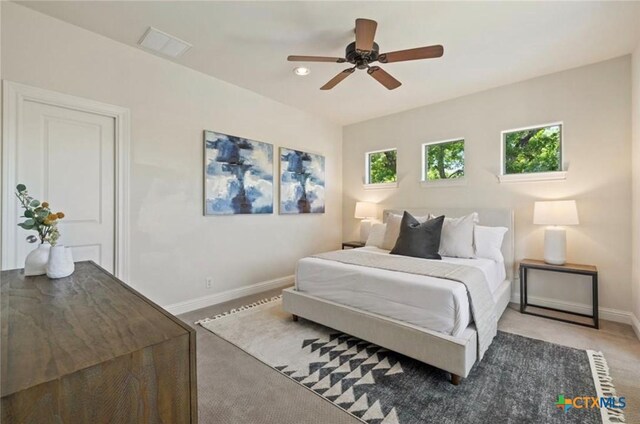 124 Schooner Dr, Lakeway, TX 78738 - bedroom with light carpet, a ceiling fan, and recessed lighting