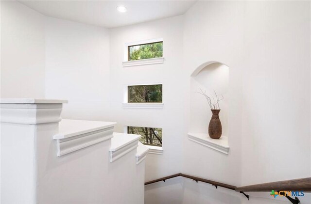124 Schooner Dr, Lakeway, TX 78738 - stairway with recessed lighting