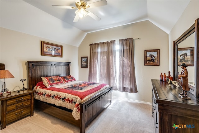 bedroom featuring vaulted ceiling, light carpet, and ceiling fan