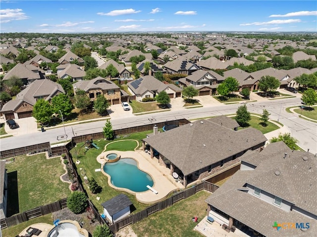 drone / aerial view with a residential view