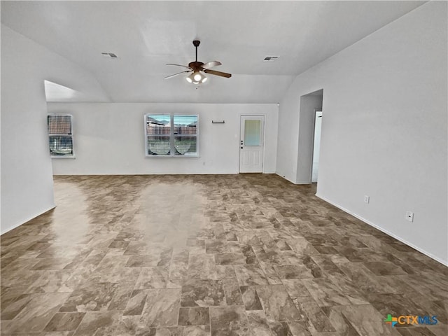 unfurnished living room featuring visible vents, ceiling fan, and vaulted ceiling