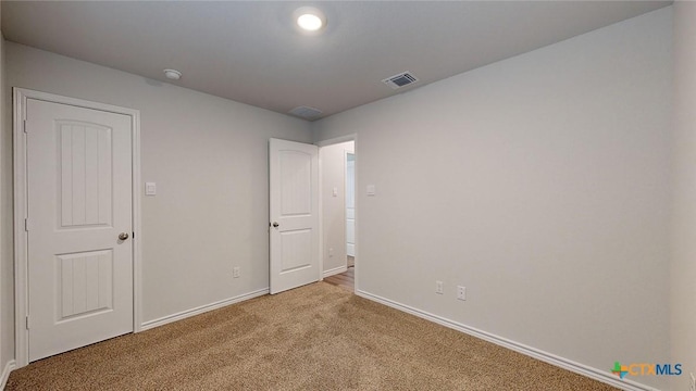 4024 Hayes Ct, Belton, TX 76513 - unfurnished bedroom with light colored carpet and baseboards