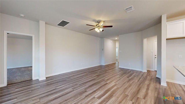 4024 Hayes Ct, Belton, TX 76513 - unfurnished room with a ceiling fan, light wood finished floors, baseboards, and a smoke detector