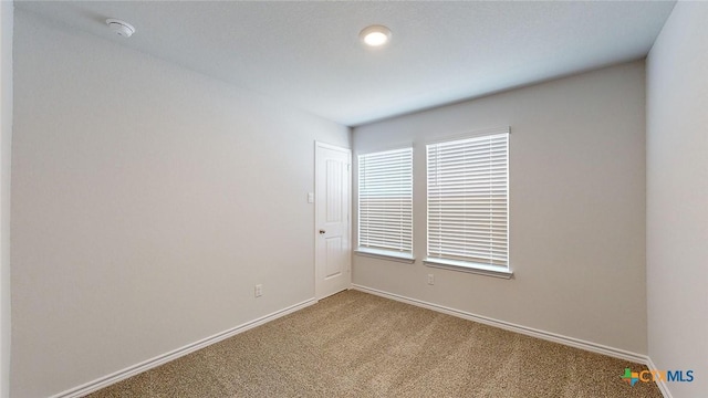 4024 Hayes Ct, Belton, TX 76513 - unfurnished room featuring carpet flooring, a smoke detector, and baseboards