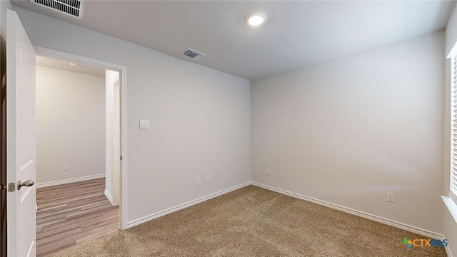 4024 Hayes Ct, Belton, TX 76513 - spare room featuring baseboards and light colored carpet