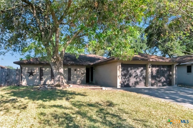 ranch-style house with a front lawn and a garage