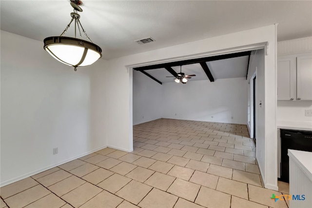 unfurnished living room with beamed ceiling, ceiling fan, and light tile patterned flooring