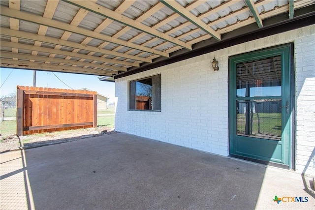 view of patio / terrace with an attached carport