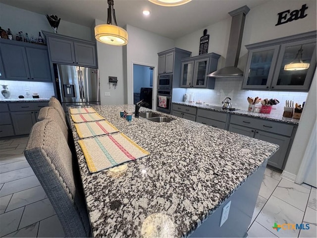 3220 Wild Seed Dr, Salado, TX 76571 - kitchen with gray cabinets, marble finish floor, a sink, appliances with stainless steel finishes, and wall chimney exhaust hood