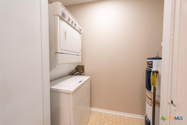 402 N Fredericksburg St Unit 9, San Marcos, TX 78666 - laundry area featuring stacked washing machine and dryer, water heater, and light floors