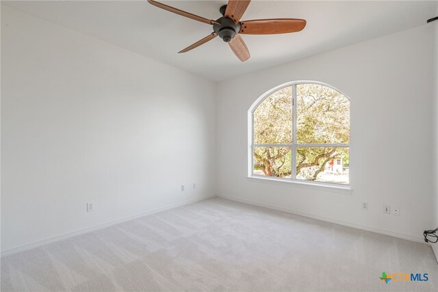 200 Tovas Secret Cv, Georgetown, TX 78628 - carpeted empty room featuring ceiling fan and baseboards