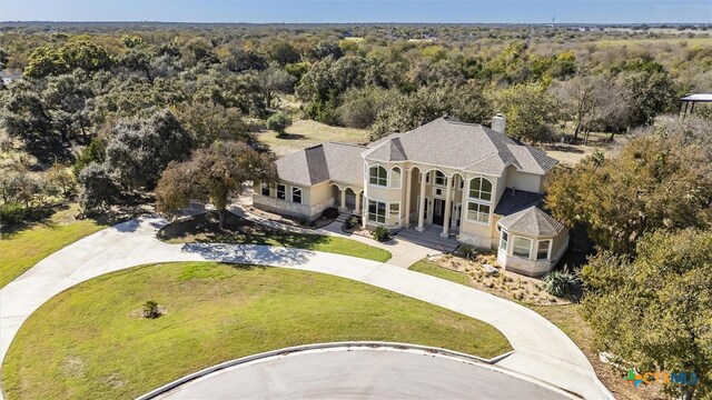 200 Tovas Secret Cv, Georgetown, TX 78628 - aerial view of property and surrounding area with a forest