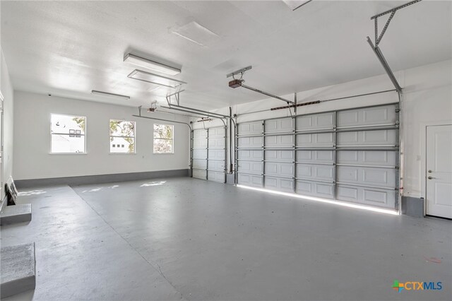 200 Tovas Secret Cv, Georgetown, TX 78628 - garage with a garage door opener