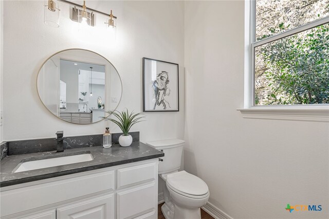200 Tovas Secret Cv, Georgetown, TX 78628 - bathroom with vanity and toilet