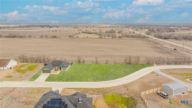 birds eye view of property featuring a rural view