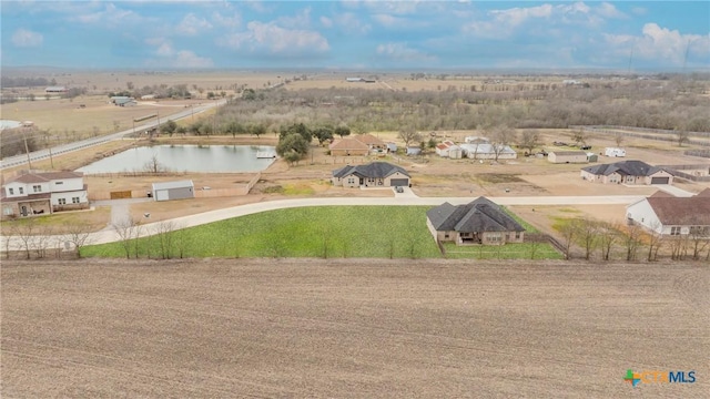 7112 Kc Ranch Ct, Temple, TX 76501 - view of front of home featuring brick siding, a garage, board and batten siding, a front yard, and concrete driveway