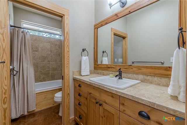 full bathroom with vanity, toilet, and shower / bath combo with shower curtain