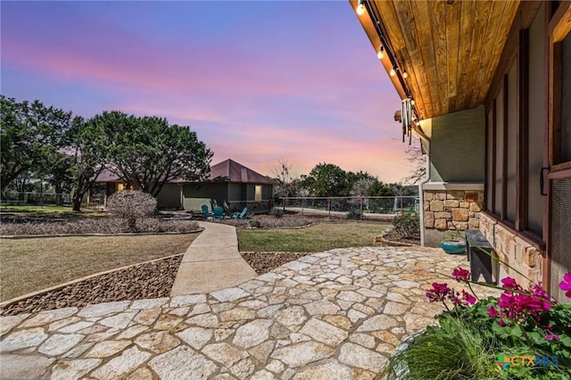 patio terrace at dusk with fence