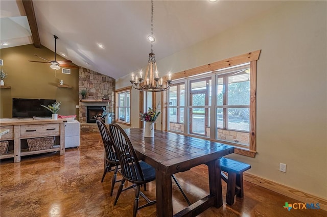 dining room with visible vents, beam ceiling, high vaulted ceiling, ceiling fan with notable chandelier, and a stone fireplace