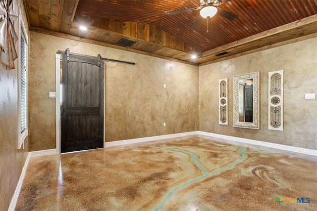 343 Riverside Dr, Killeen, TX 76542 - unfurnished room with finished concrete floors, a ceiling fan, a barn door, wooden ceiling, and vaulted ceiling