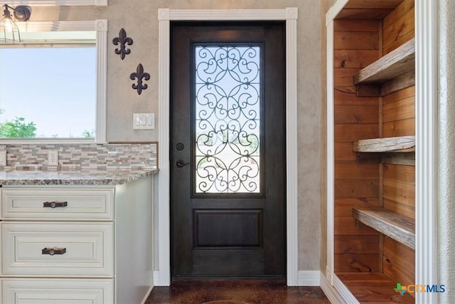 343 Riverside Dr, Killeen, TX 76542 - entryway with healthy amount of natural light and baseboards