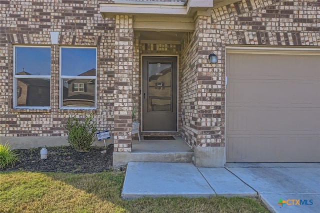 entrance to property with a garage