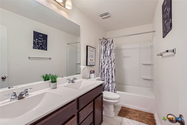 full bathroom with vanity, shower / tub combo with curtain, tile patterned flooring, and toilet