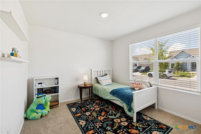 1004 Norway Dr, Seguin, TX 78155 - carpeted bedroom with baseboards